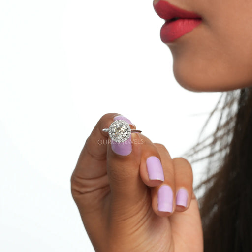 close view of old european round cut diamond halo wedding ring solitaire