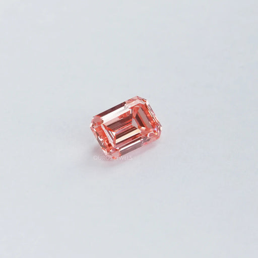side view of pink emerald cut lab created diamond loose