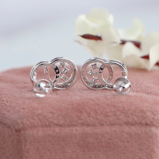 back view of round shaped lab made diamond stud earrings crystal